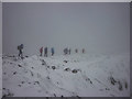 SD2797 : Walkers leaving the summit of the Old Man by Karl and Ali