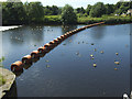 SE2119 : Floats protecting Greenwood Weir by Stephen Craven