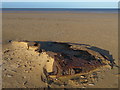 TF7544 : Army tank rusting on Titchwell beach in Norfolk by Richard Humphrey