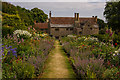 SZ4083 : The Double Herbaceous Border, Mottistone Gardens by Ian Capper