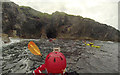 NB1143 : Heading into a cave on the north side of Seanna Chnoc by Andy Waddington