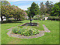 NT3235 : Traquair garden, fountain, apple trees by David Hawgood