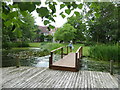 TL7304 : Decking and pond in the grounds of Pontlands Park Hotel, Great Baddow, Essex by Jeremy Bolwell