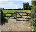 SO7704 : Wooden gates across a field entrance, Eastington by Jaggery