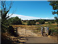 SP7364 : Gate and track near Northampton by Malc McDonald