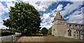 SK9725 : The church of St. Thomas of Canterbury: Churchyard tree by Bob Harvey