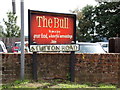 TM1234 : The Bull & Stutton Road signs by Geographer