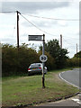 TM1134 : Signpost on Church Lane by Geographer