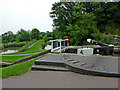 SP6989 : Lock gate and footbridge on the Foxton flight in Leicestershire by Roger  D Kidd