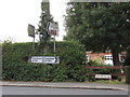 TL8528 : Roadsigns on the A1124 High Street by Geographer