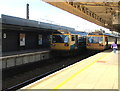 ST1875 : Two Class 142 trains in Cardiff Central station by Jaggery