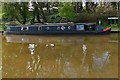 SJ6543 : Audlem: Moored houseboat by Michael Garlick