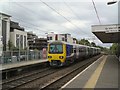 SJ8590 : EMU to Crewe at East Didsbury by Gerald England