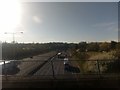 TQ5792 : M25 approaching the A12 junction, from the railway bridge by Christopher Hilton