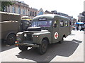 TL1998 : Classic Land Rover military ambulance on Cathedral Square, Peterborough by Paul Bryan