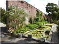 NX0942 : Garden wall, Logan Botanic Garden by Oliver Dixon