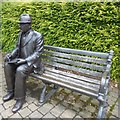 SJ9995 : L S Lowry on a bench by Gerald England