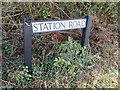 TL7818 : Station Road sign on Station Road by Geographer