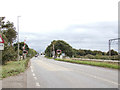 TL5787 : Mow Fen Level Crossing on the A10 by Geographer