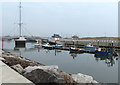 SH9980 : Moored boats on the River Clwyd at Rhyl by Mat Fascione