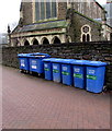 SS7597 : Blue wheelie bins alongside a churchyard perimeter wall, Neath by Jaggery