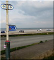 SH9478 : Cycle route direction sign in Pensarn 5 miles from Rhyl by Jaggery