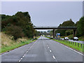 NS3937 : Bridge over the eastbound A71 near Crosshouse by David Dixon