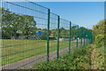 TQ1657 : Footpath alongside Leatherhead Trinity School by Ian Capper