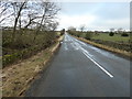 NZ0419 : Road heading north towards Kinninvie by Christine Johnstone