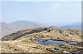 NM9291 : Lochan near summit of east top of Carn Mòr by Trevor Littlewood