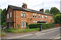 SK5801 : Row of four houses on NE side of Knighton Lane East by Roger Templeman