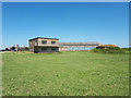 SP1812 : Control tower, pillbox, hangar and barn, former RAF Windrush by Vieve Forward