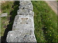 NZ0645 : Top of wall made from stone block railway sleepers by Adrian Taylor