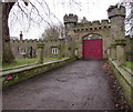 SJ3165 : Path towards the castellated entrance to Hawarden Park, Hawarden by Jaggery