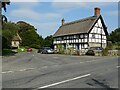 SO3772 : Thatched timber-framed cottages by Philip Halling