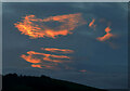 NT4636 : Orange clouds over Meigle Hill by Walter Baxter