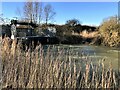 TF3902 : Flood water surging under Rings End sluice - The Nene Washes by Richard Humphrey