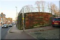 NY3955 : Abutment of bridge of dismantled railway at east end of Port Road by Roger Templeman