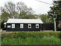 TM3278 : Linstead village hall and village sign by Adrian S Pye