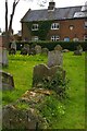 TM2972 : Laxfield: Church Villas on Church Walk, from the churchyard by Christopher Hilton