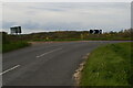 TM3067 : Bend in the B1120 approaching Hill Farm by Christopher Hilton