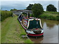 SJ6448 : Narrowboat moored next to Burrows Bridge No 85 by Mat Fascione