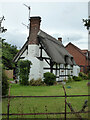 SO8651 : Thatched house, Norton, Worcestershire by Chris Allen