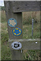 TF0206 : Waymarks on a fence past by Bob Harvey