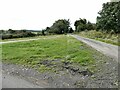 NZ0550 : Road junction triangle near Wallish Walls Farm by Oliver Dixon