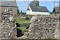 SO3404 : Stone stile in churchyard wall, Kemeys Commander by M J Roscoe