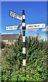 NY5048 : Cumberland County Council finger signpost at T-junction in front of buildings at Froddle Crook by Roger Templeman