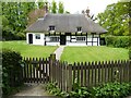 SO7337 : Timber-framed thatched cottage by Philip Halling