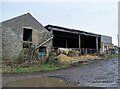 NZ0953 : Muddy farmyard at Panshields by Robert Graham