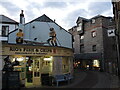 SX9256 : Evening falls around the shops in Brixham by Neil Owen